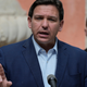 Florida Gov. Ron DeSantis speaks during a news conference, Feb. 1, 2022, in Miami.